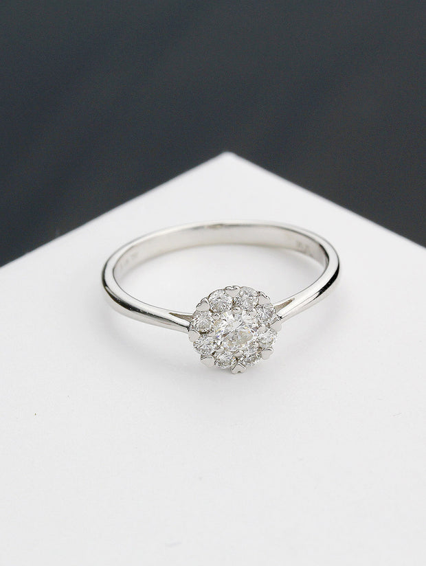 Almost Floral Round Diamond Ring